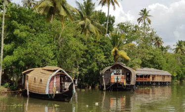 Traditional houseboat on Kochi backwaters - Kerala tour from Madurai